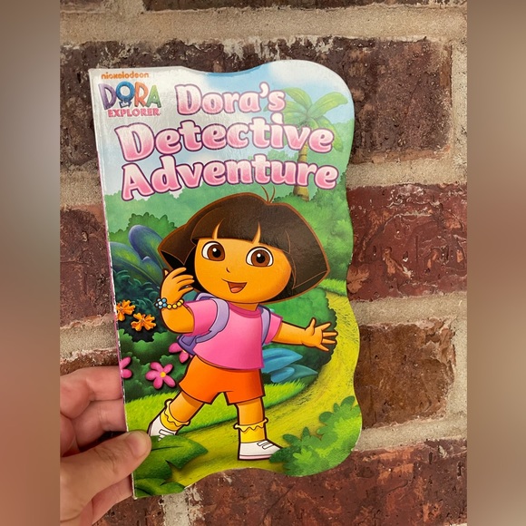 Little Kid’s Dora’s Detective Adventure Board Book Dora The Explorer - Picture 1 of 7